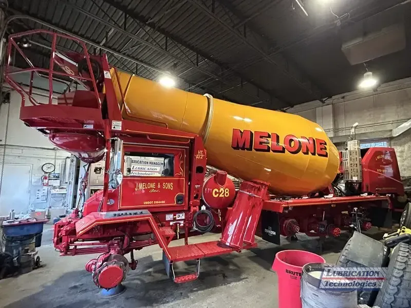 ReliaMAX™ Automatic Lubrication System installation on Oshkosh® S-Series™ Front Discharge Mixer
